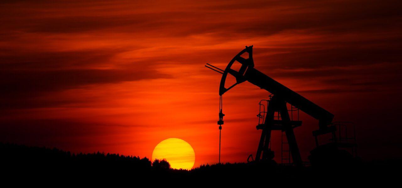 oil pumpjack at sunset
