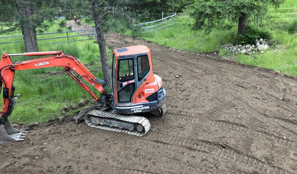 mini excavator on new driveway