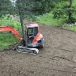 mini excavator on new driveway