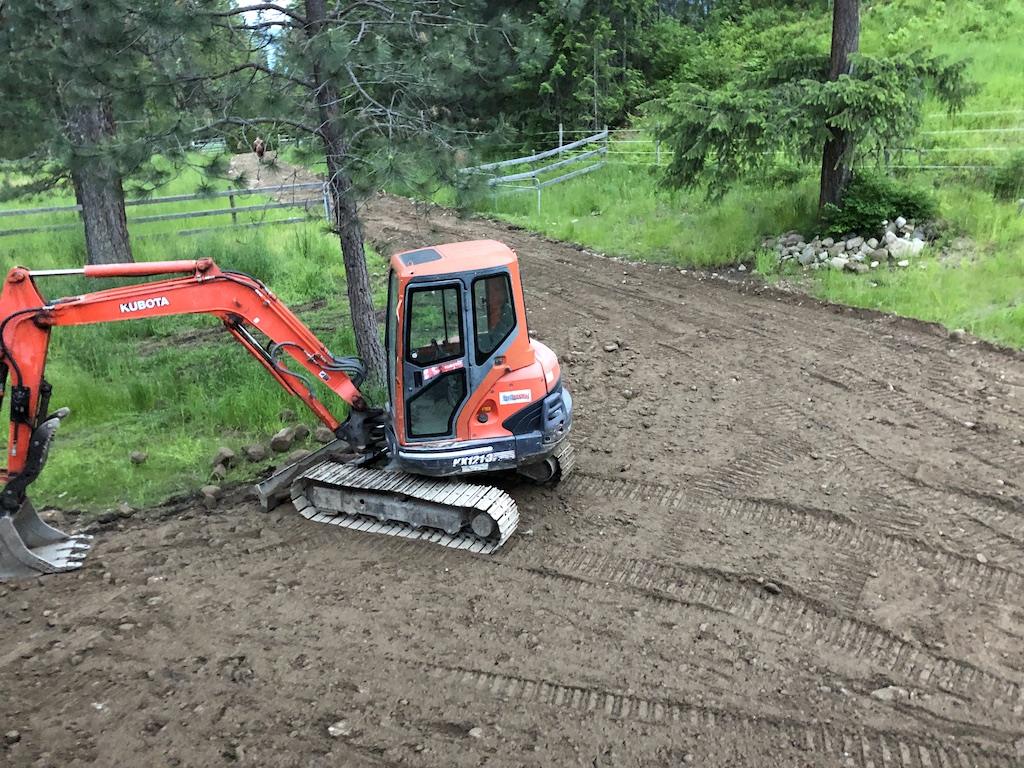mini excavator on new driveway